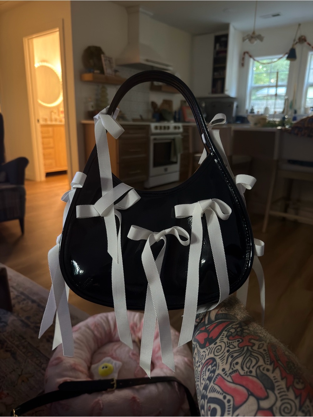 Black Coachtopia Ergo Bag with White Ribbon Accents